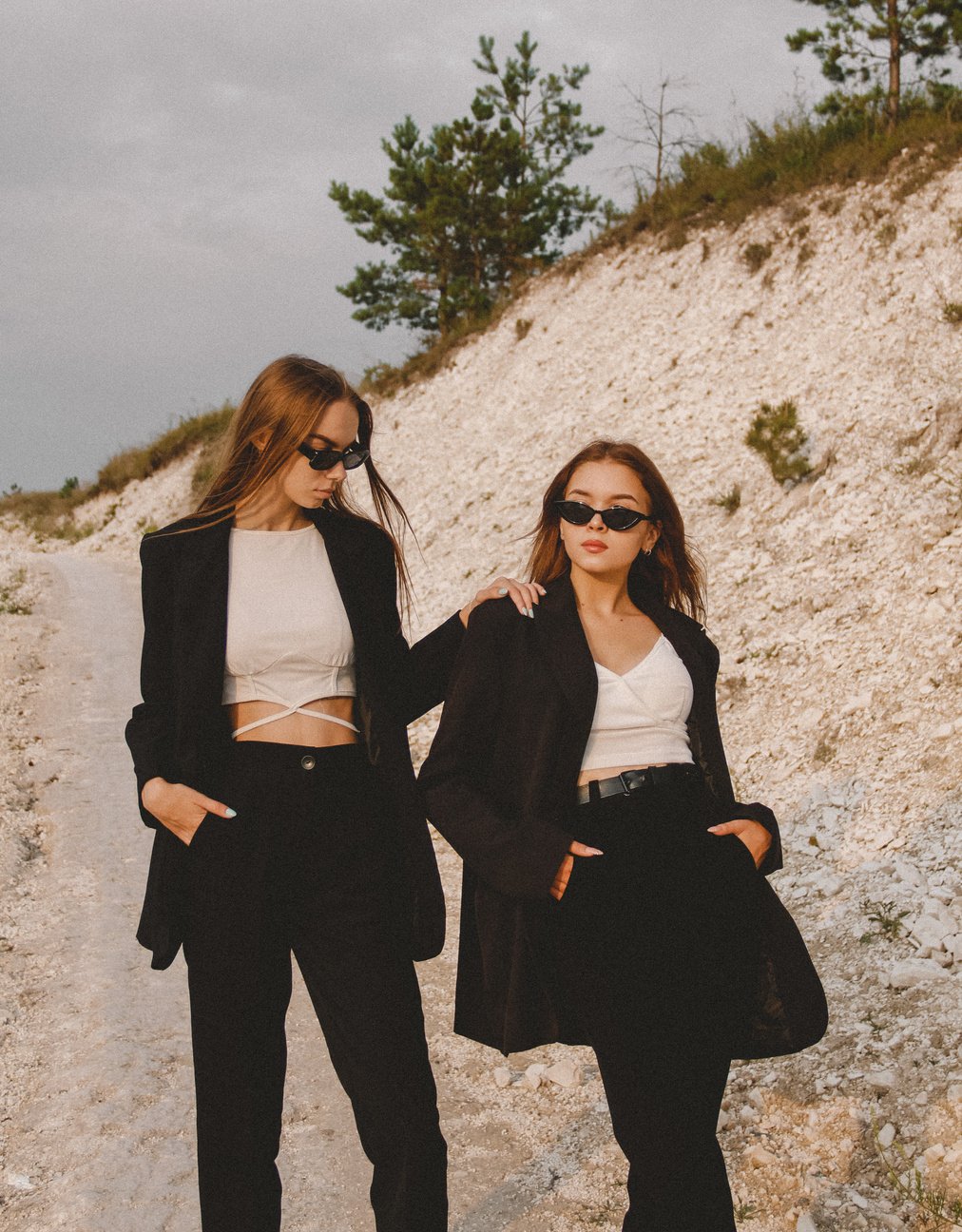 Stylish Women in Black Blazer and Sunglasses